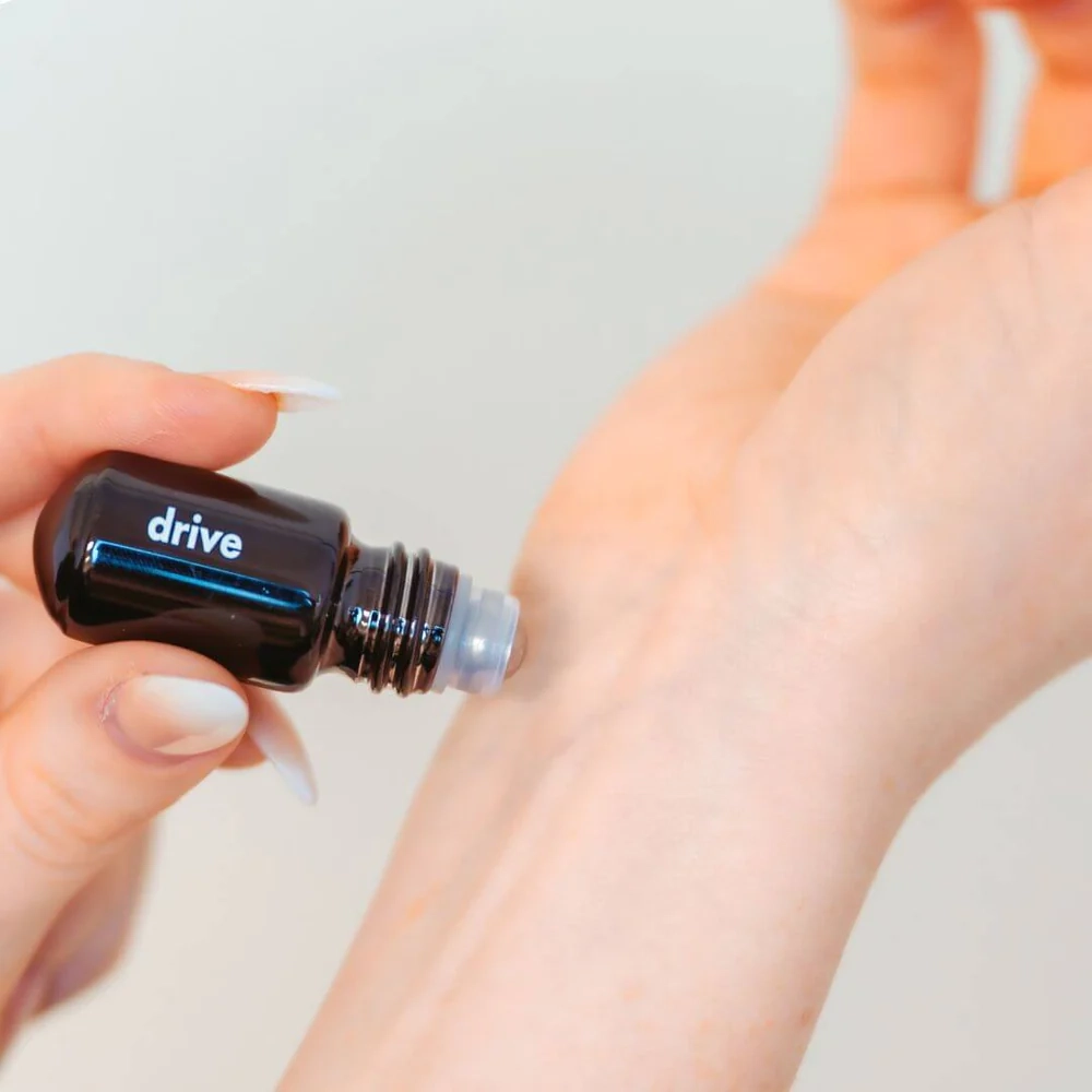 Drive Moodzee roller ball being applied to pulse point