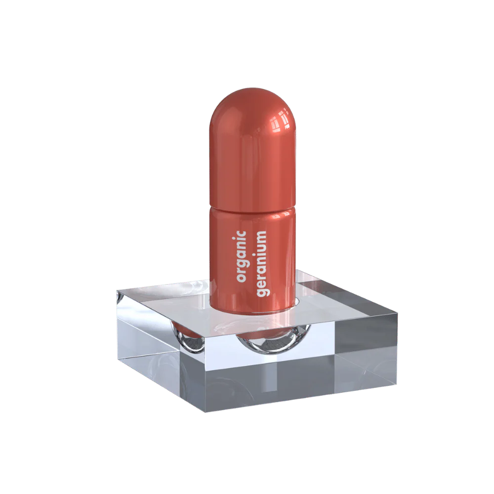 Geranium Moodzee roller ball being applied to pulse point