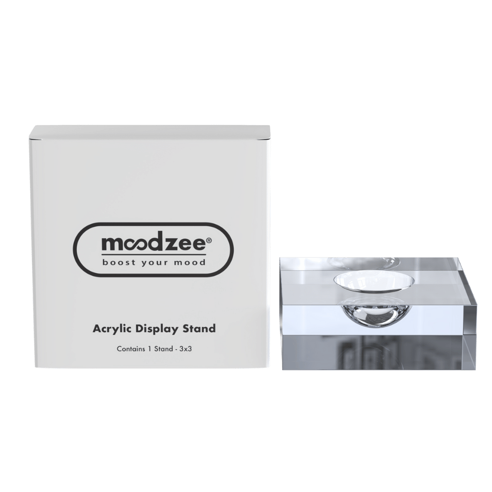 Moodzee Acrylic Display Stand'  with boxnext to a clear acrylic display stand 