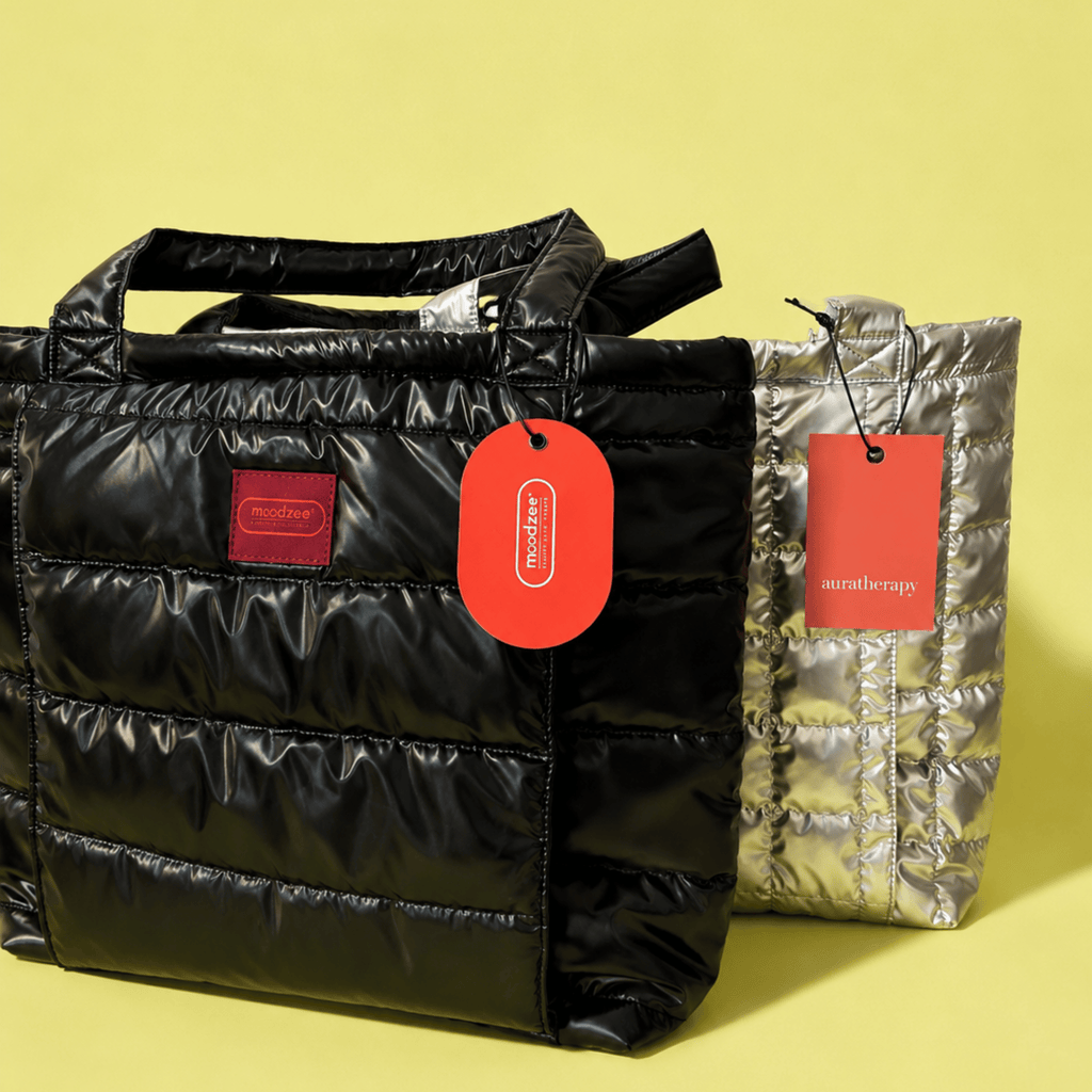 A sleek quilted bag in black with a built-in yoga mat pouch and roomy interior — padded polyester, comfortable straps, $85. Your grab-and-go essential.