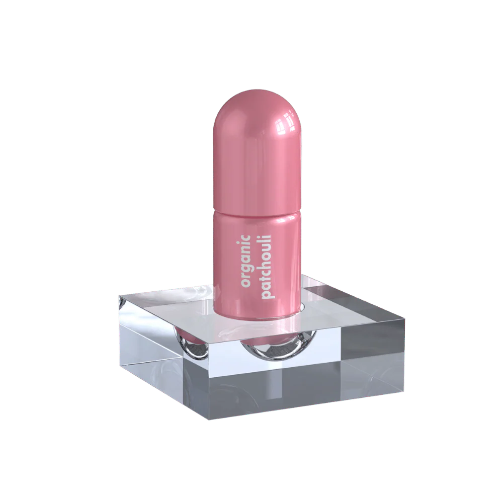 Patchouli Moodzee roller ball being applied to pulse point