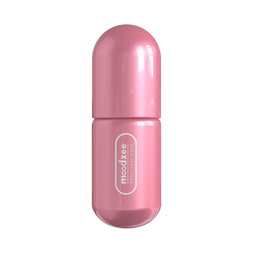 Patchouli Moodzee roller ball, logo side view, pink pill bottle