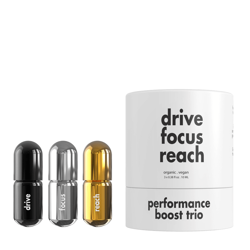 Performance Boost Gift Set with Drive, Focus, and Reach roller balls beside the round paper box